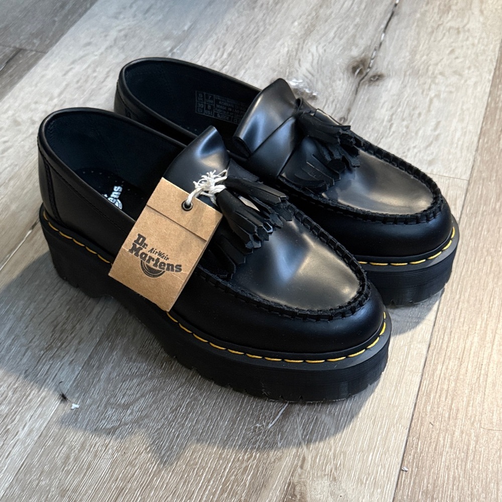 Dr. Martens Black Platform Kiltie Tassel Loafers (Adrian Quad)